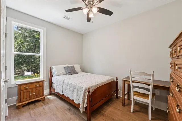 a dining room with furniture window and outside view