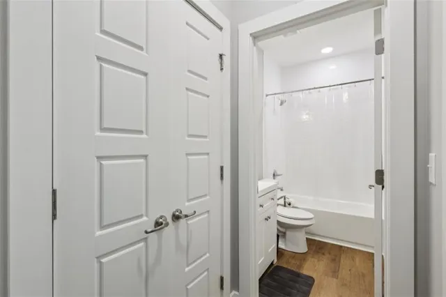 a view of a dining room with furniture and window