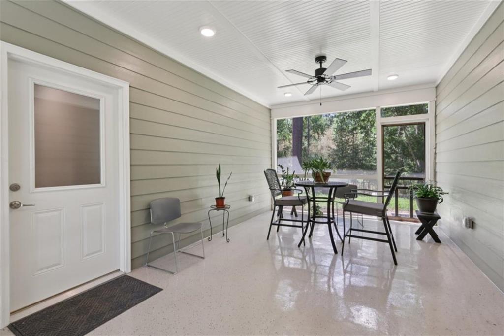 250 Stagecoach Road Oxford, GA 30054 - Photo 36 of 76 a dining room with furniture window and outside view