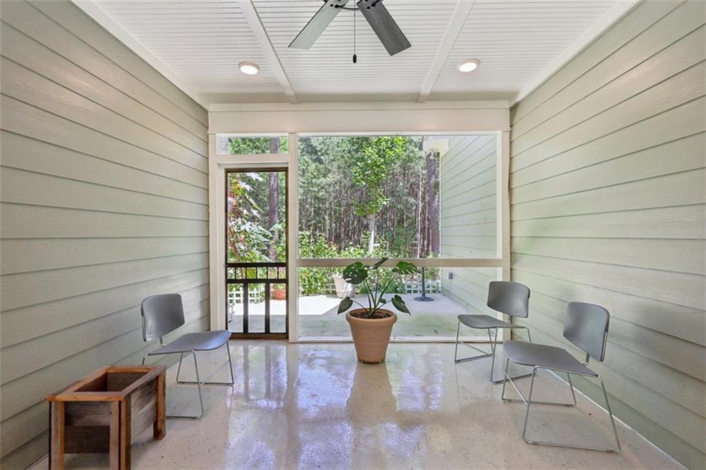 250 Stagecoach Road Oxford, GA 30054 - Photo 38 of 76 a living room with furniture and a potted plant
