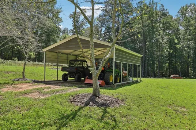 a view of a yard with an outdoor space