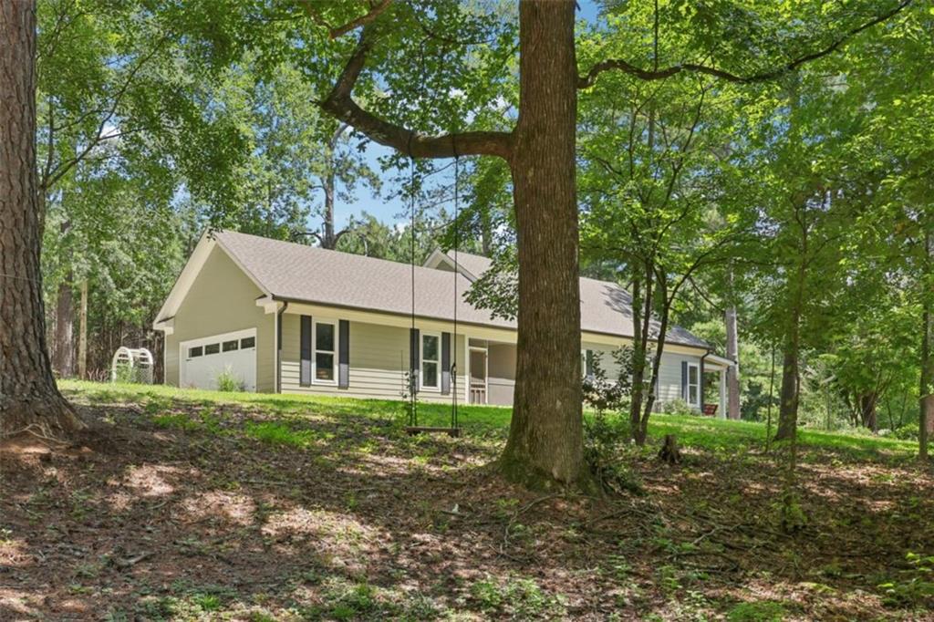 250 Stagecoach Road Oxford, GA 30054 - Photo 76 of 76 front view of a house with a tree