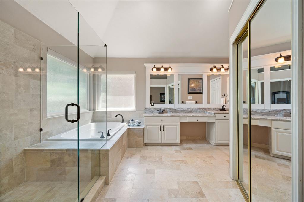 2532 Springhill Drive Grapevine, TX 76051 - Photo 20 of 40 Primary bath has been updated with Quartzite counters and a seamless shower