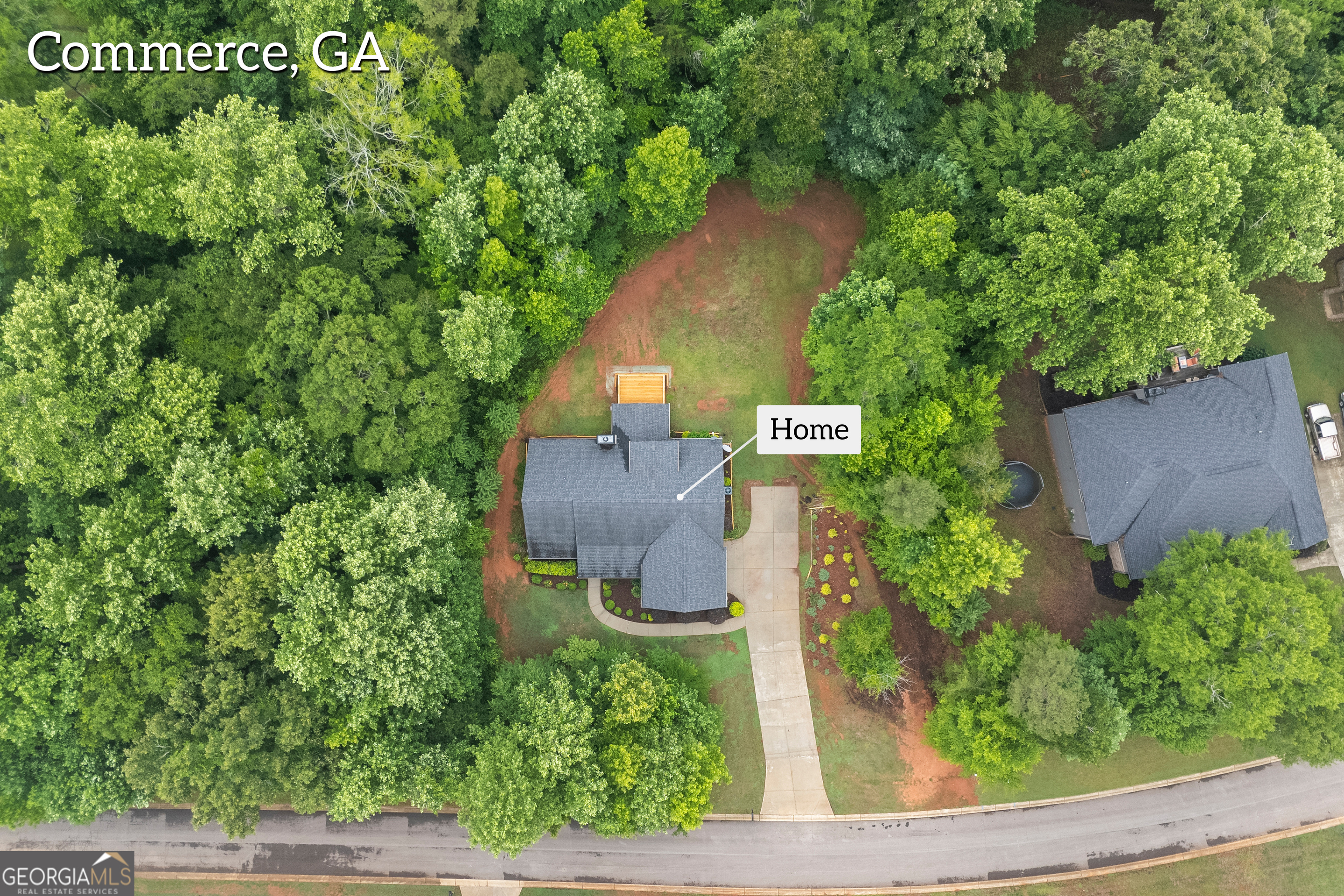 717 Oconee Lane Commerce, GA 30529 - Photo 4 of 57 an aerial view of a house yard and outdoor space