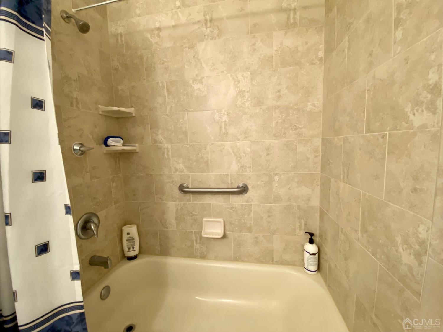 51 Boulder Drive Edison, NJ 08817 - Photo 12 of 24 a bathroom with a bath tub