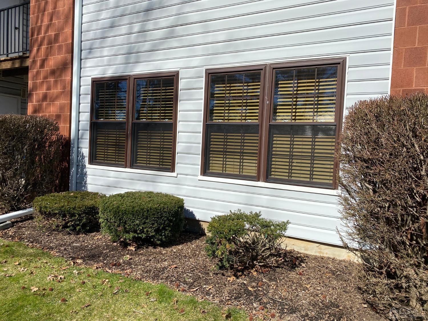 51 Boulder Drive Edison, NJ 08817 - Photo 21 of 24 a front view of a house with a yard and outdoor seating