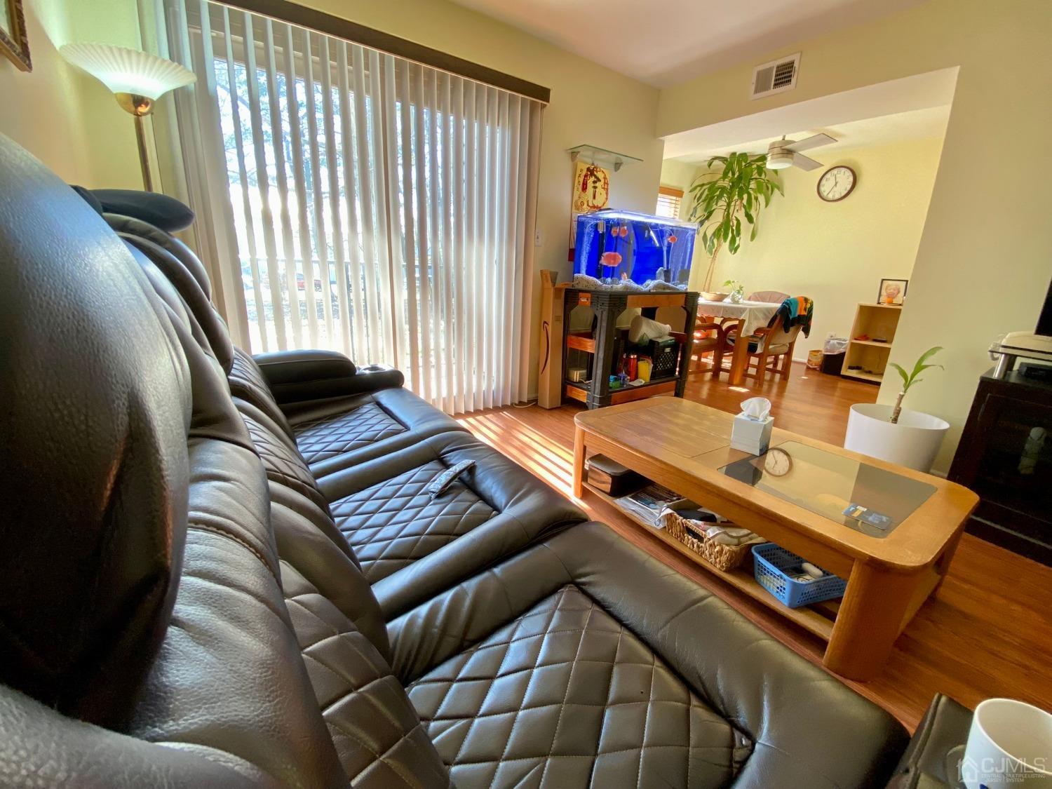 51 Boulder Drive Edison, NJ 08817 - Photo 6 of 24 a living room with furniture and a window