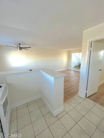 a view of a kitchen with a sink