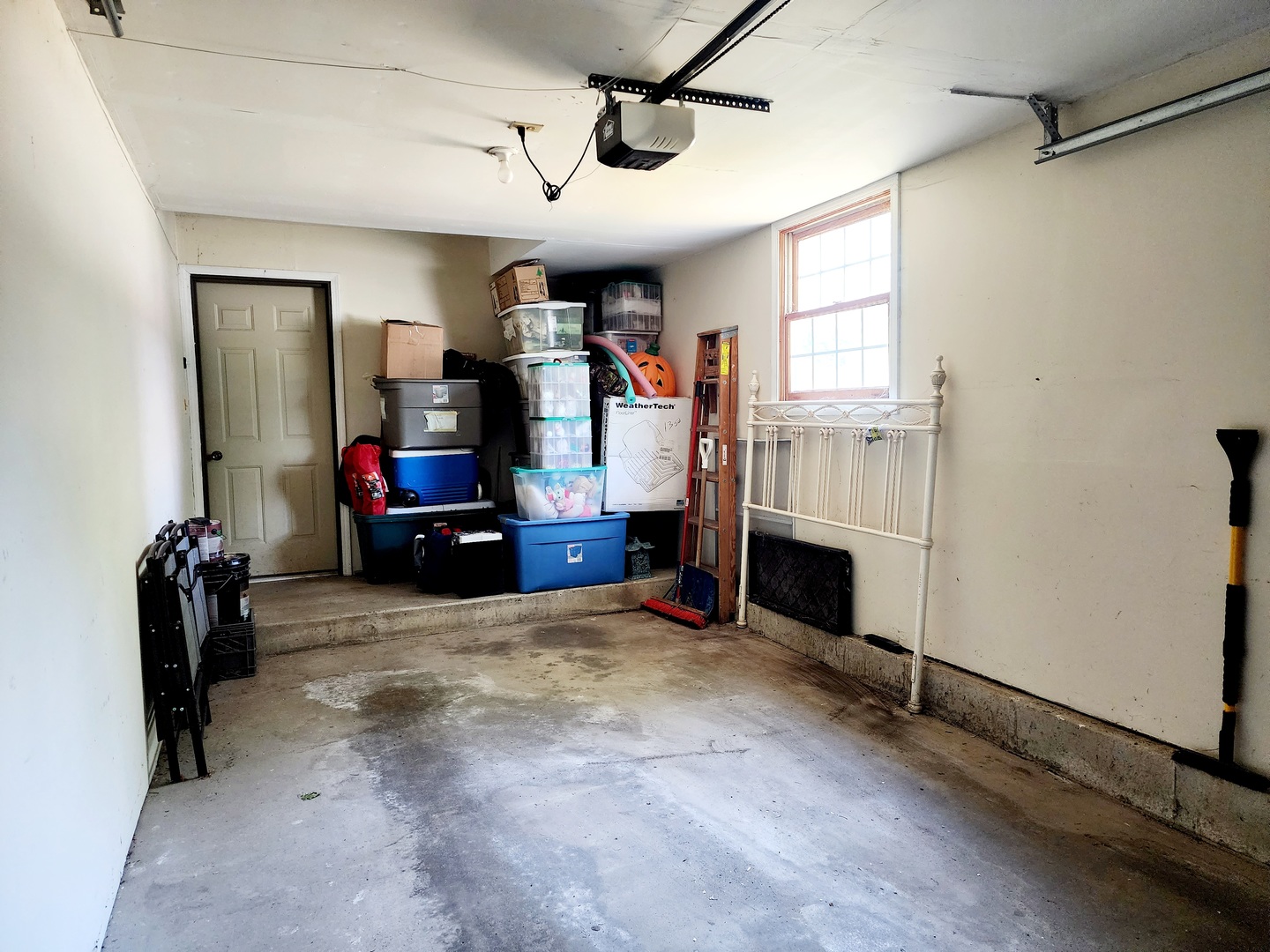 2124\ Lancaster Circle, Unit 202A Naperville, IL 60565 - Photo 14 of 14 a living room with furniture and a fireplace