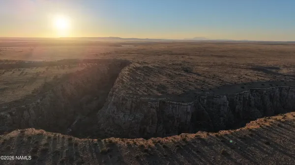 a view of a backyard of a house