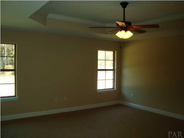 2908 Wallace Lake Road Pace, FL 32571 - Photo 11 of 23 Master Bedroom with raised ceiling