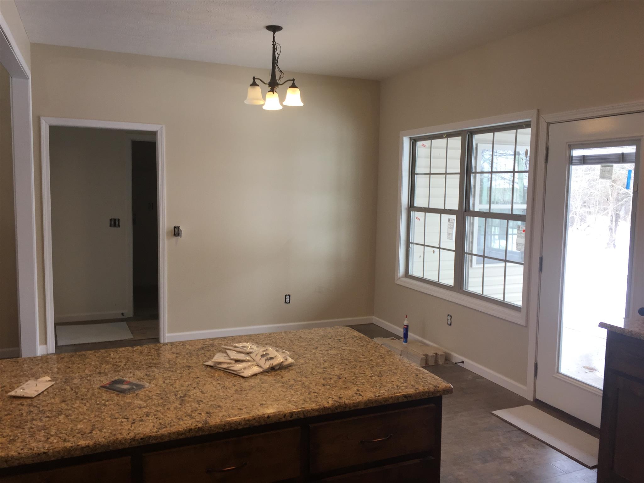 385 South Ray Road Portland, TN 37148 - Photo 4 of 8 a bathroom with granite countertop cabinets and window