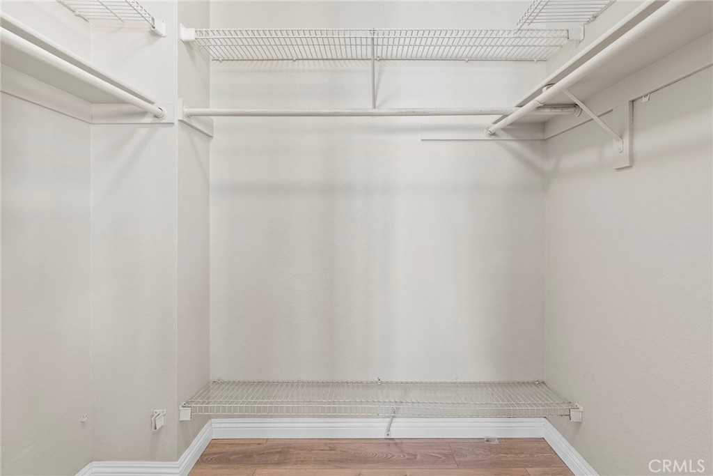 2000 Pacific Coast Highway, Unit 102 Huntington Beach, CA 92648 - Photo 22 of 35 a view of an empty walk in closet