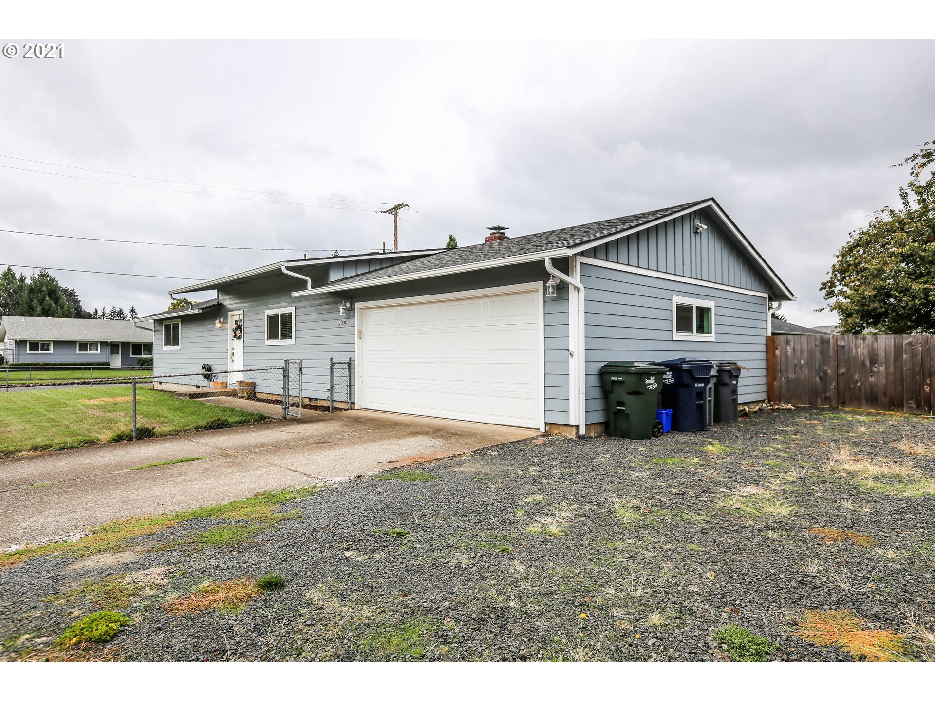 710 53rd Street Springfield, OR 97478 - Photo 2 of 16 a view of a house with a yard