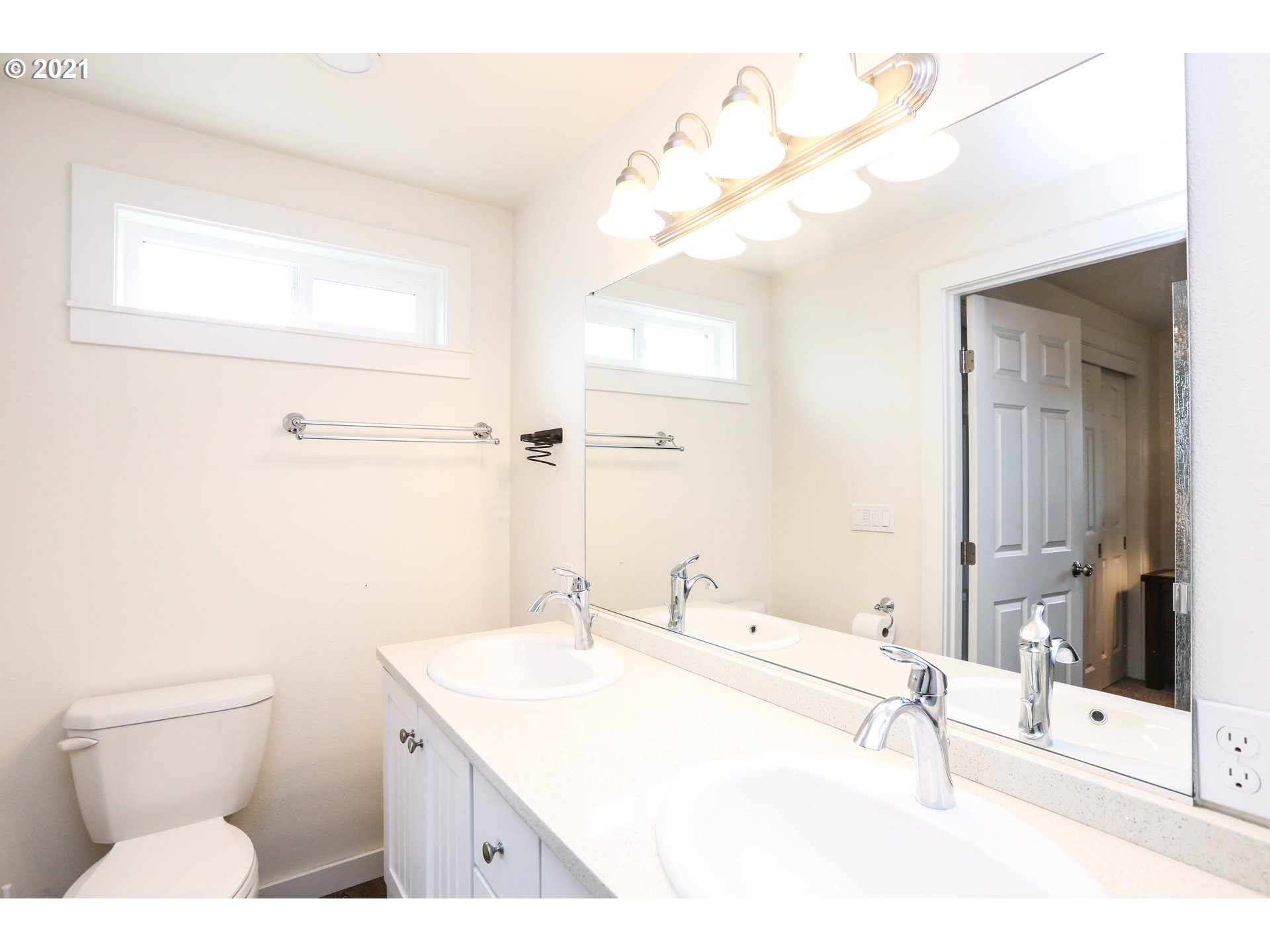 710 53rd Street Springfield, OR 97478 - Photo 11 of 16 a bathroom with a sink a toilet and shower