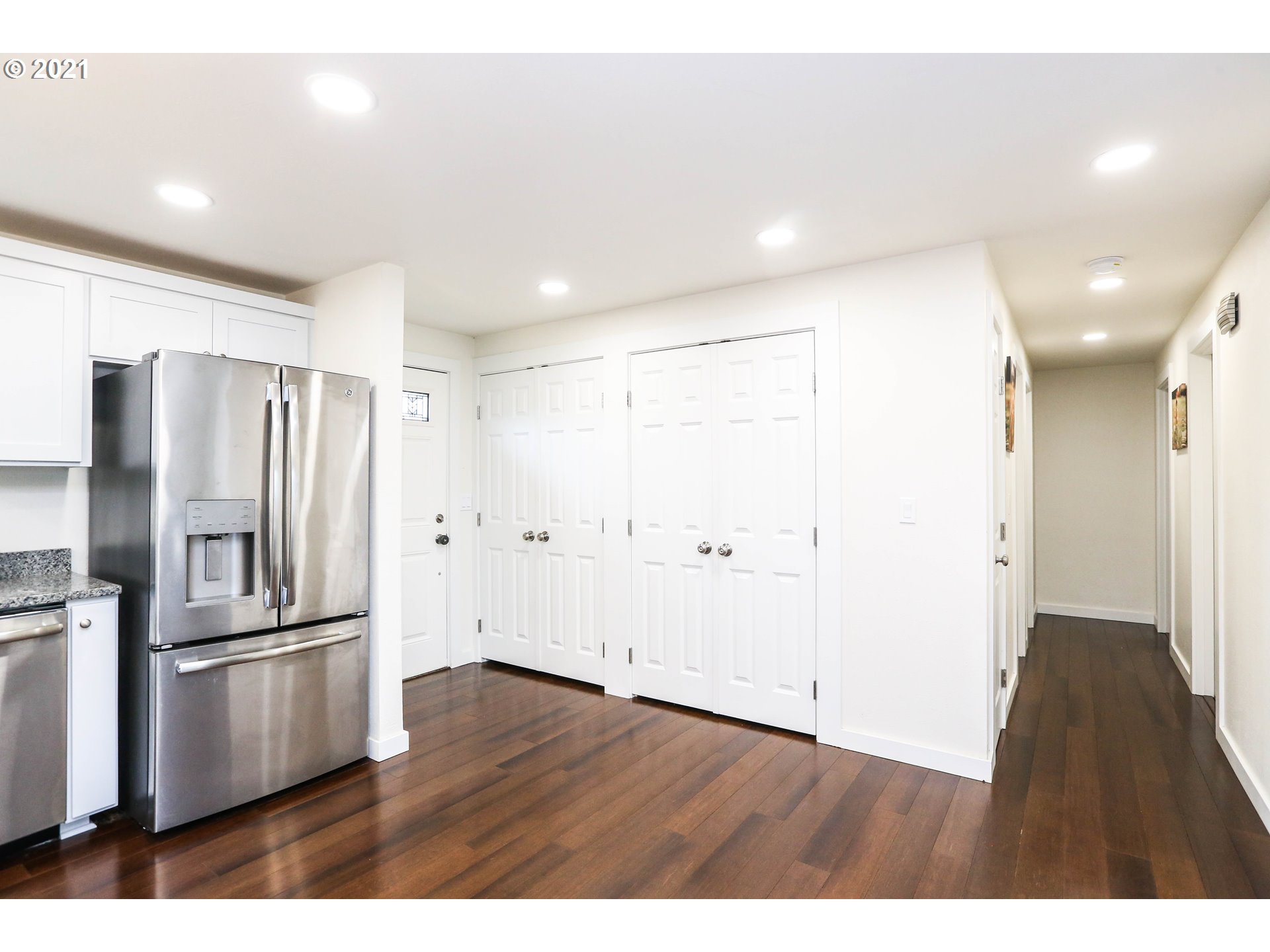 710 53rd Street Springfield, OR 97478 - Photo 7 of 16 a view of a kitchen with a refrigerator and wooden floor
