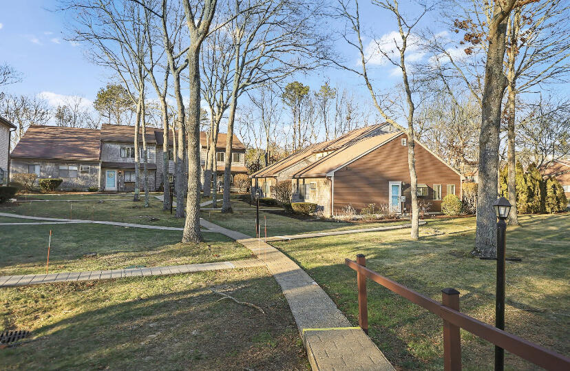 18 Round House Road Monument Beach, MA 02532 - Photo 1 of 16 a view of swimming pool with a house and sitting area
