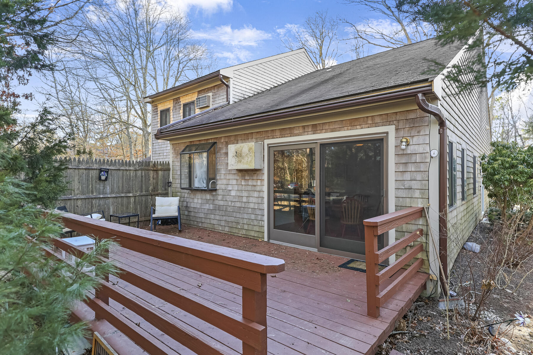 18 Round House Road Monument Beach, MA 02532 - Photo 14 of 16 a view of house with outdoor seating area