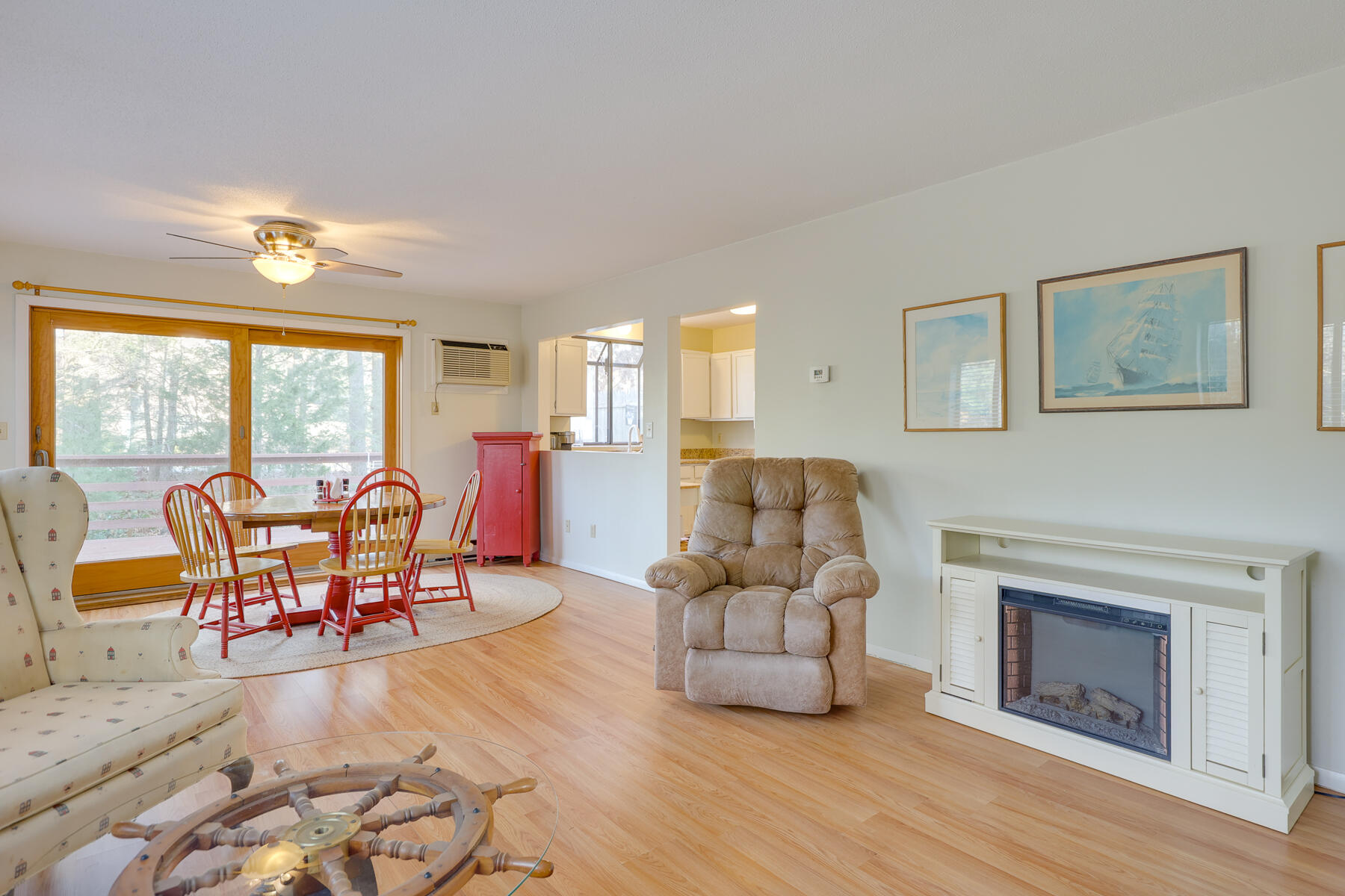 18 Round House Road Monument Beach, MA 02532 - Photo 3 of 16 a living room with furniture and a fireplace