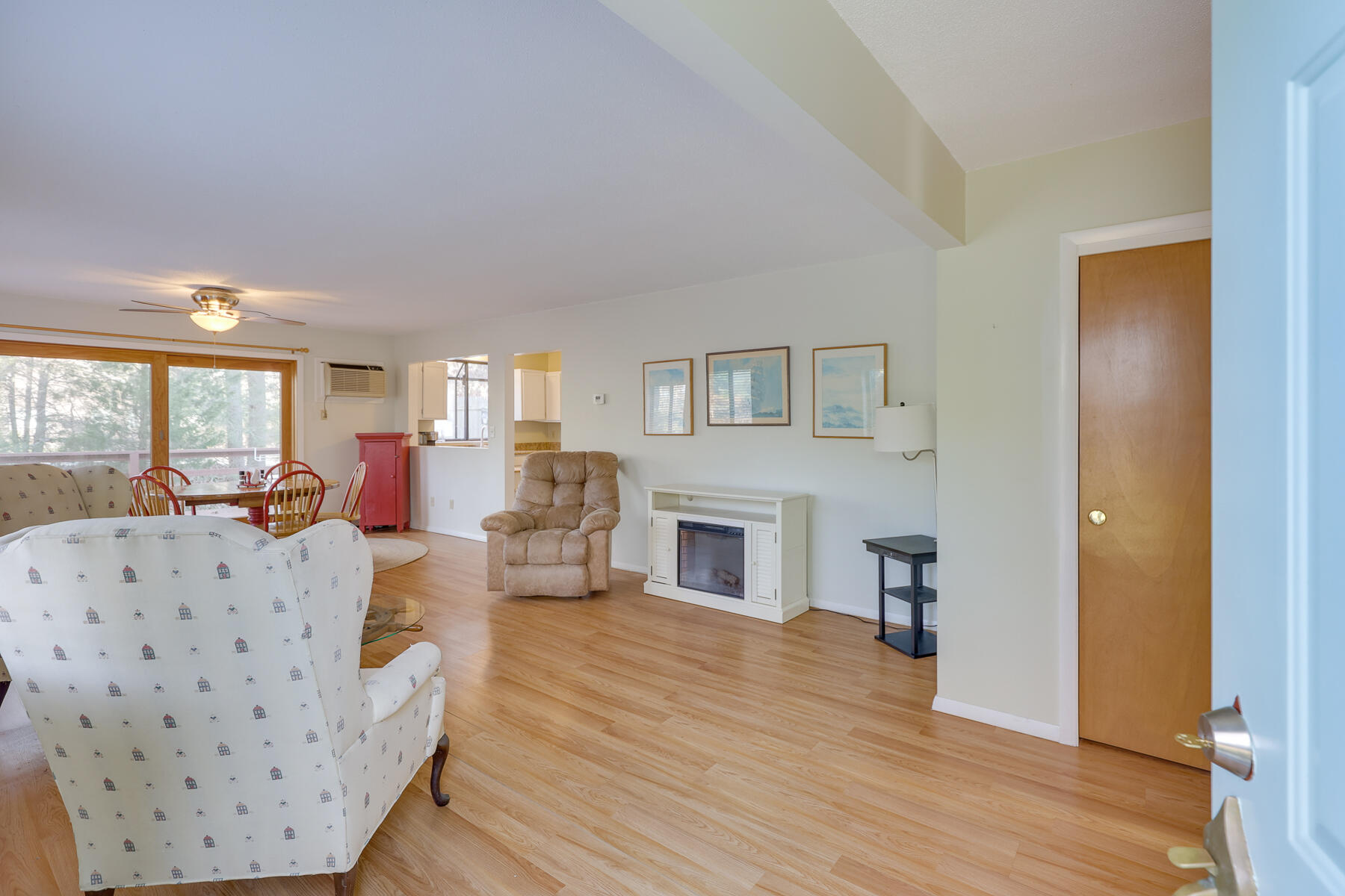 18 Round House Road Monument Beach, MA 02532 - Photo 4 of 16 a living room with furniture and a fireplace