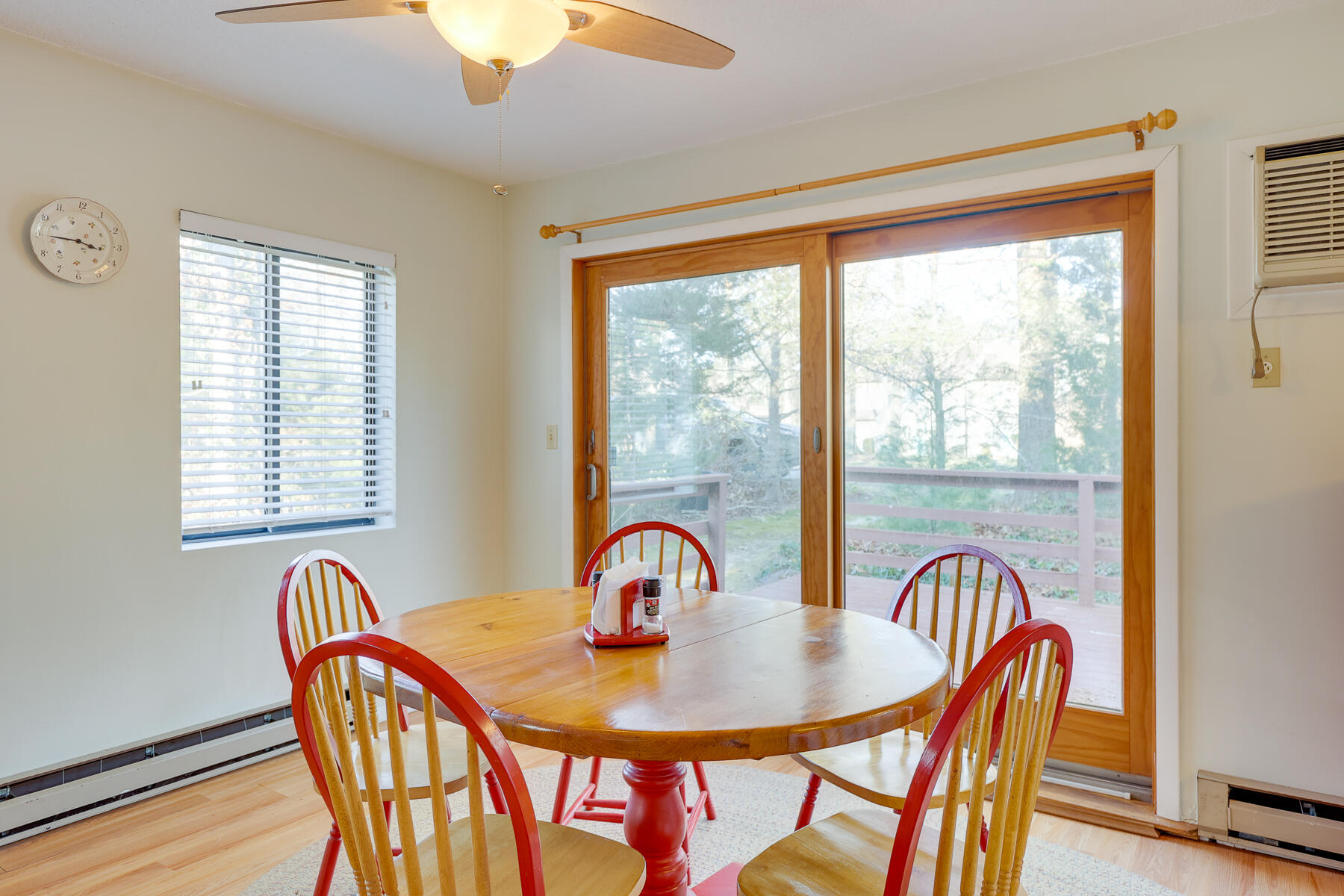 18 Round House Road Monument Beach, MA 02532 - Photo 10 of 16 a view of a dining room with furniture window and wooden floor