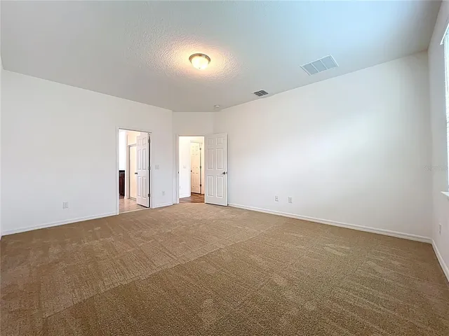 an empty room with window