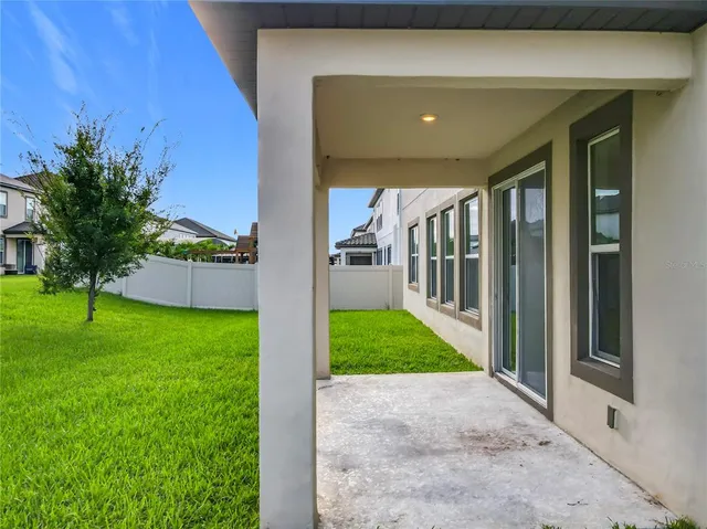 a view of a porch with a backyard