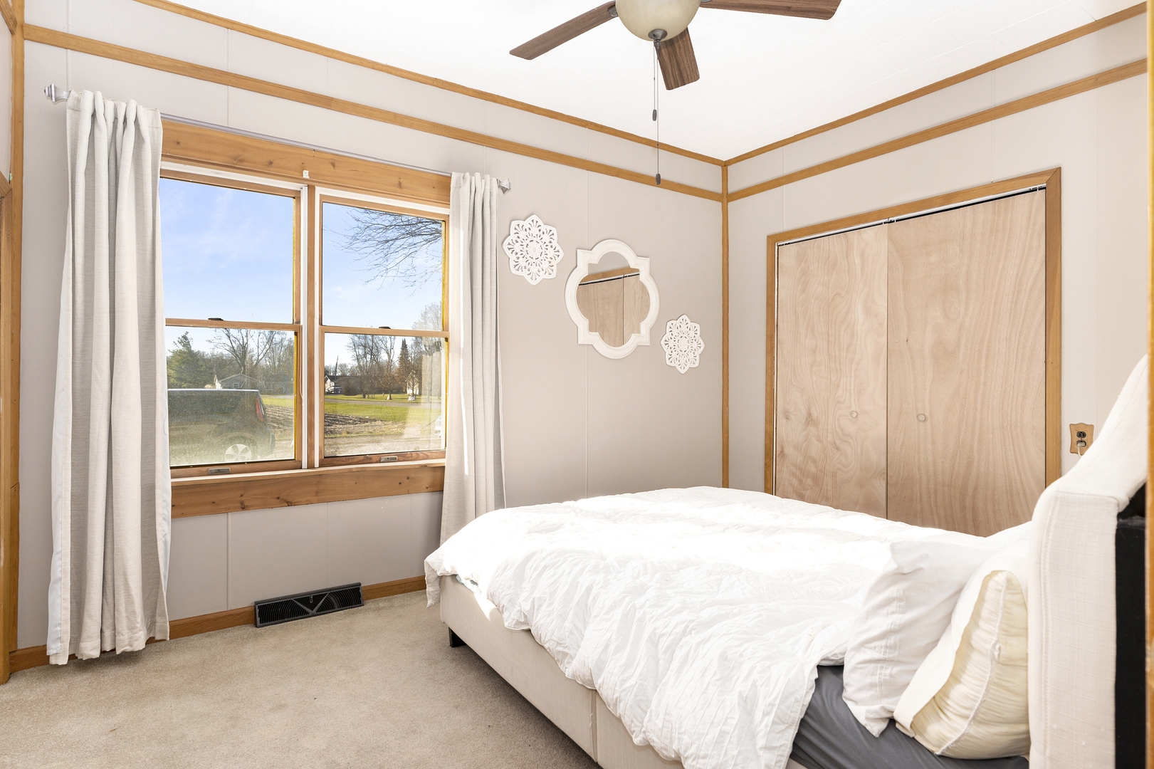 402 Center Street Mazon, IL 60444 - Photo 8 of 15 a bedroom with a large bed and a window