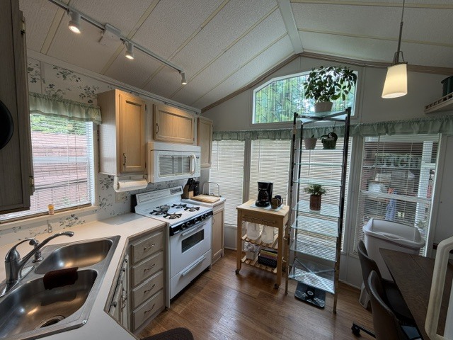 2795 East 28th Road Marseilles, IL 61341 - Photo 11 of 91 a kitchen that has a sink a stove and chairs