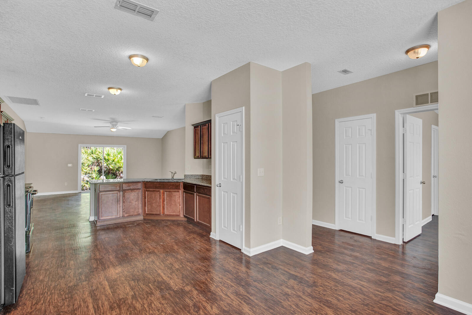 12255 Harts Road Jacksonville, FL 32218 - Photo 10 of 30 Dining to Kitchen to Living