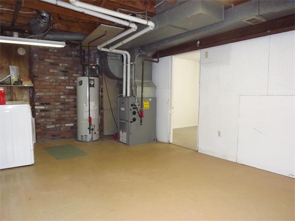 90 Holly Road Marshfield, MA 02050 - Photo 12 of 17 a view of empty room with wooden walls