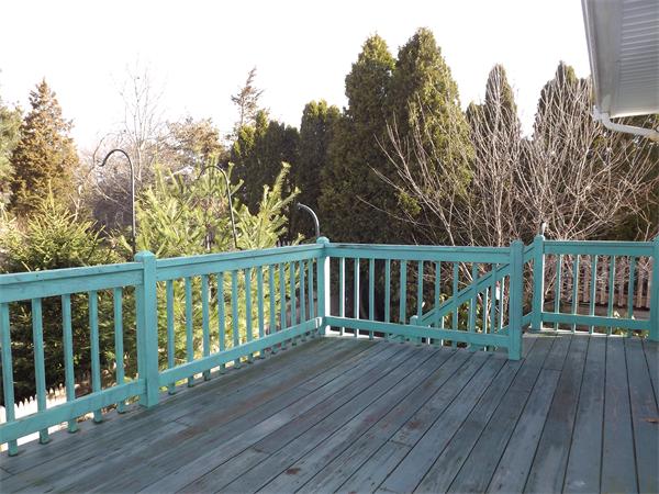 90 Holly Road Marshfield, MA 02050 - Photo 14 of 17 a balcony with wooden floor and fence