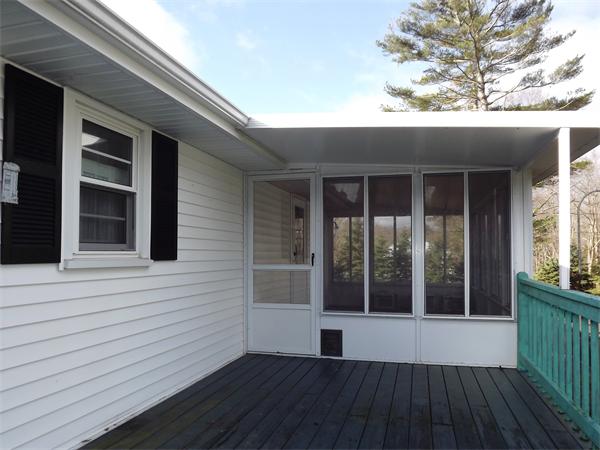 90 Holly Road Marshfield, MA 02050 - Photo 15 of 17 a view of a house with a balcony