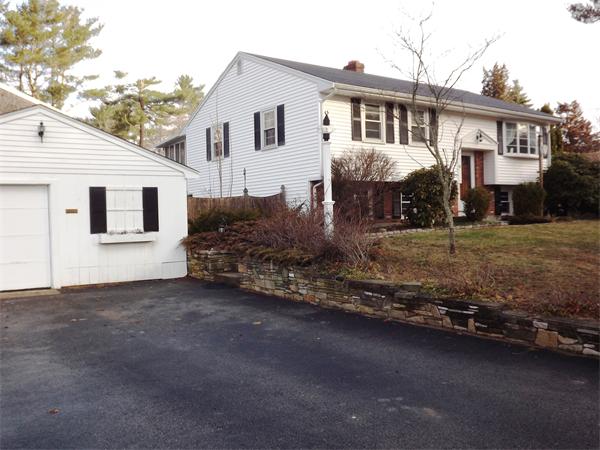 90 Holly Road Marshfield, MA 02050 - Photo 2 of 17 a front view of a house with a yard