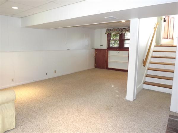 90 Holly Road Marshfield, MA 02050 - Photo 8 of 17 an empty room with windows