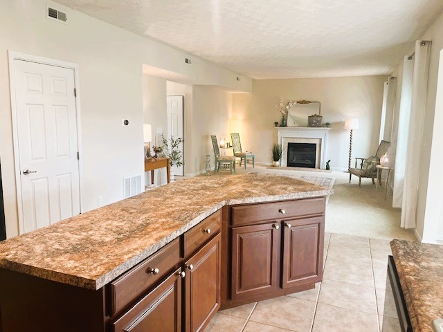 1978 Spring Ridge Drive Xenia, OH 45385 - Photo 14 of 44 This inviting space offers a seamless transition between the culinary and relaxation areas.
