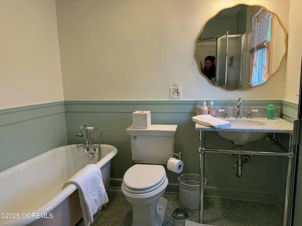a bathroom with a sink and mirror