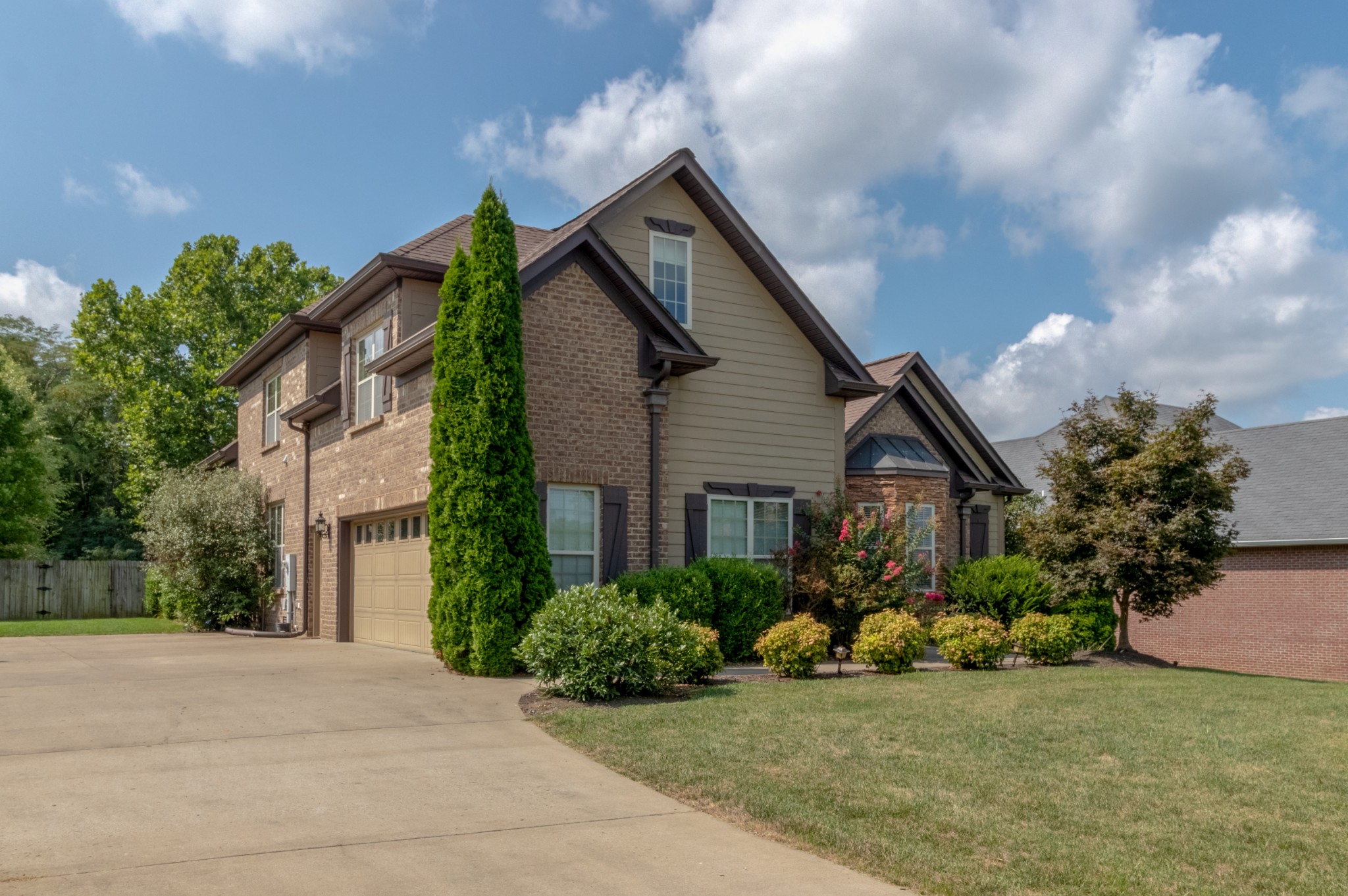 3592 Drake Road Adams, TN 37010 - Photo 2 of 47 a front view of a house with garden