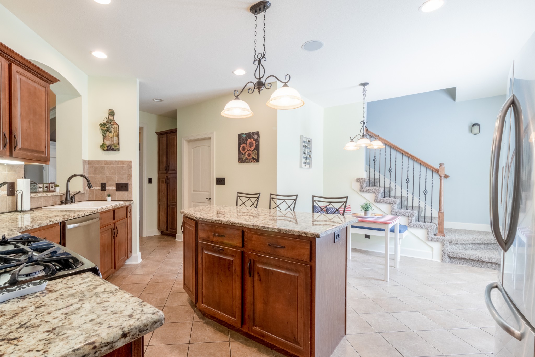3592 Drake Road Adams, TN 37010 - Photo 16 of 47 a kitchen with a stove a sink and a refrigerator