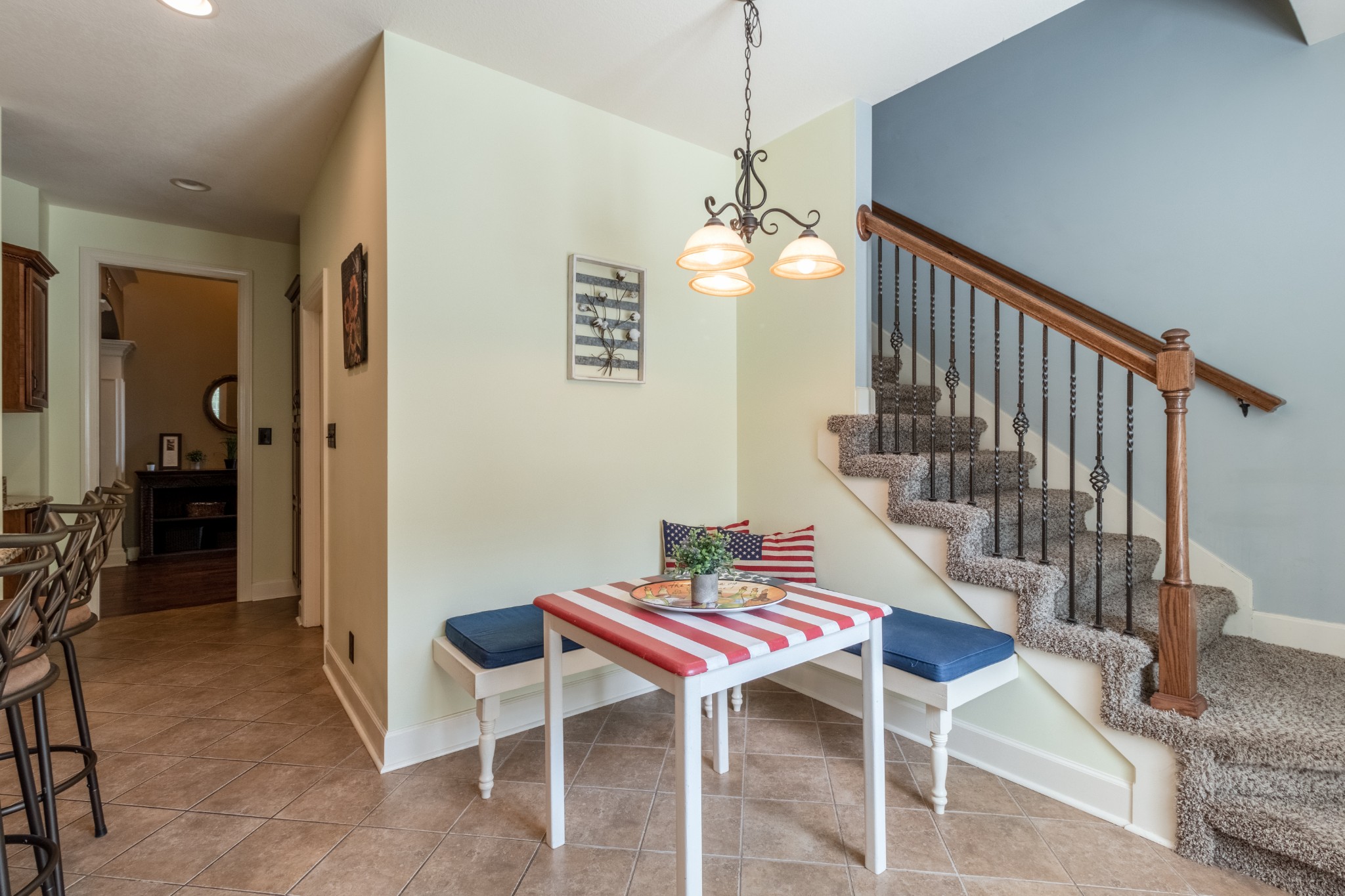 3592 Drake Road Adams, TN 37010 - Photo 17 of 47 a dining room with furniture a chandelier and wooden floor