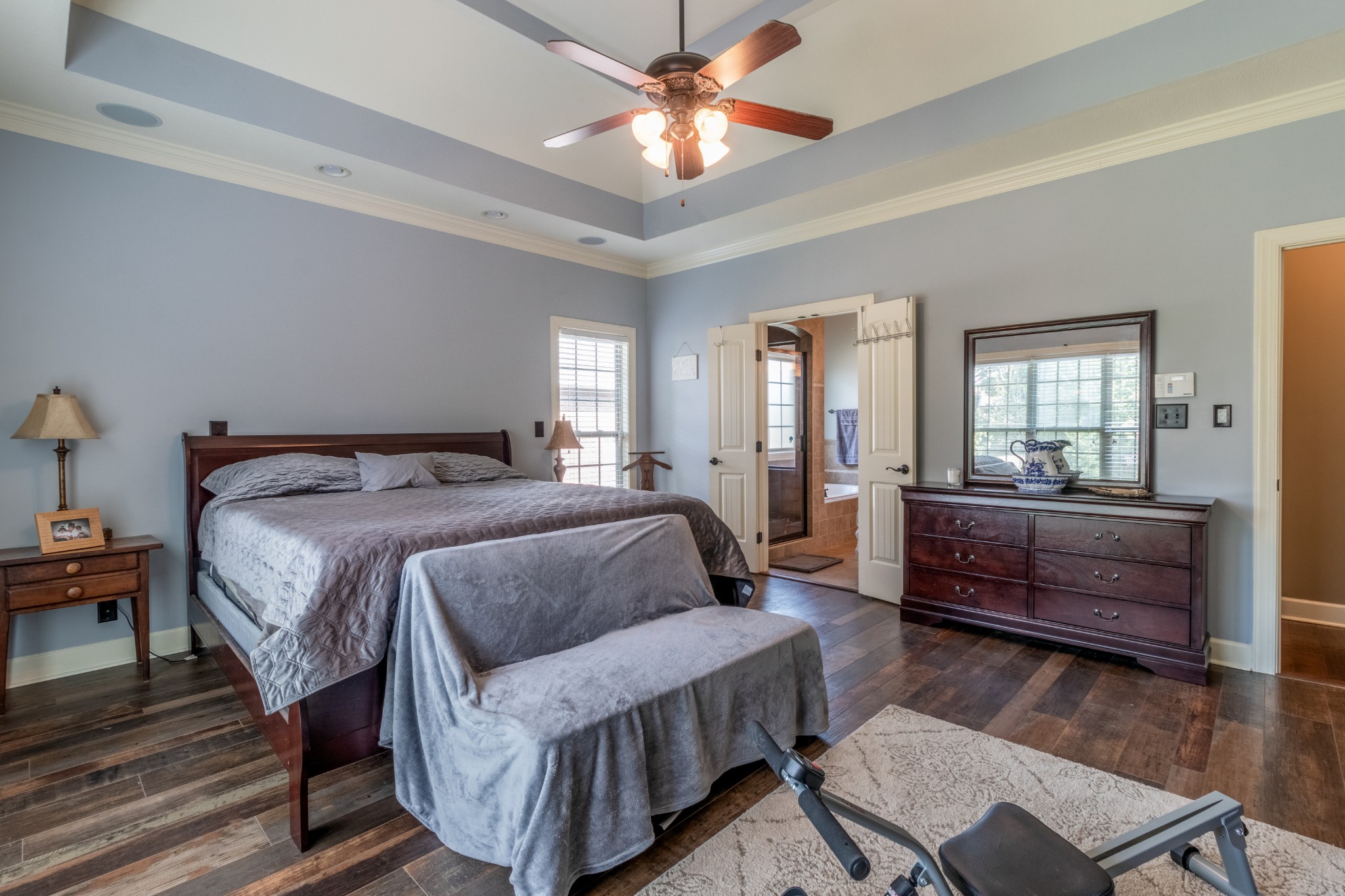 3592 Drake Road Adams, TN 37010 - Photo 20 of 47 a bedroom with a bed and wooden floor