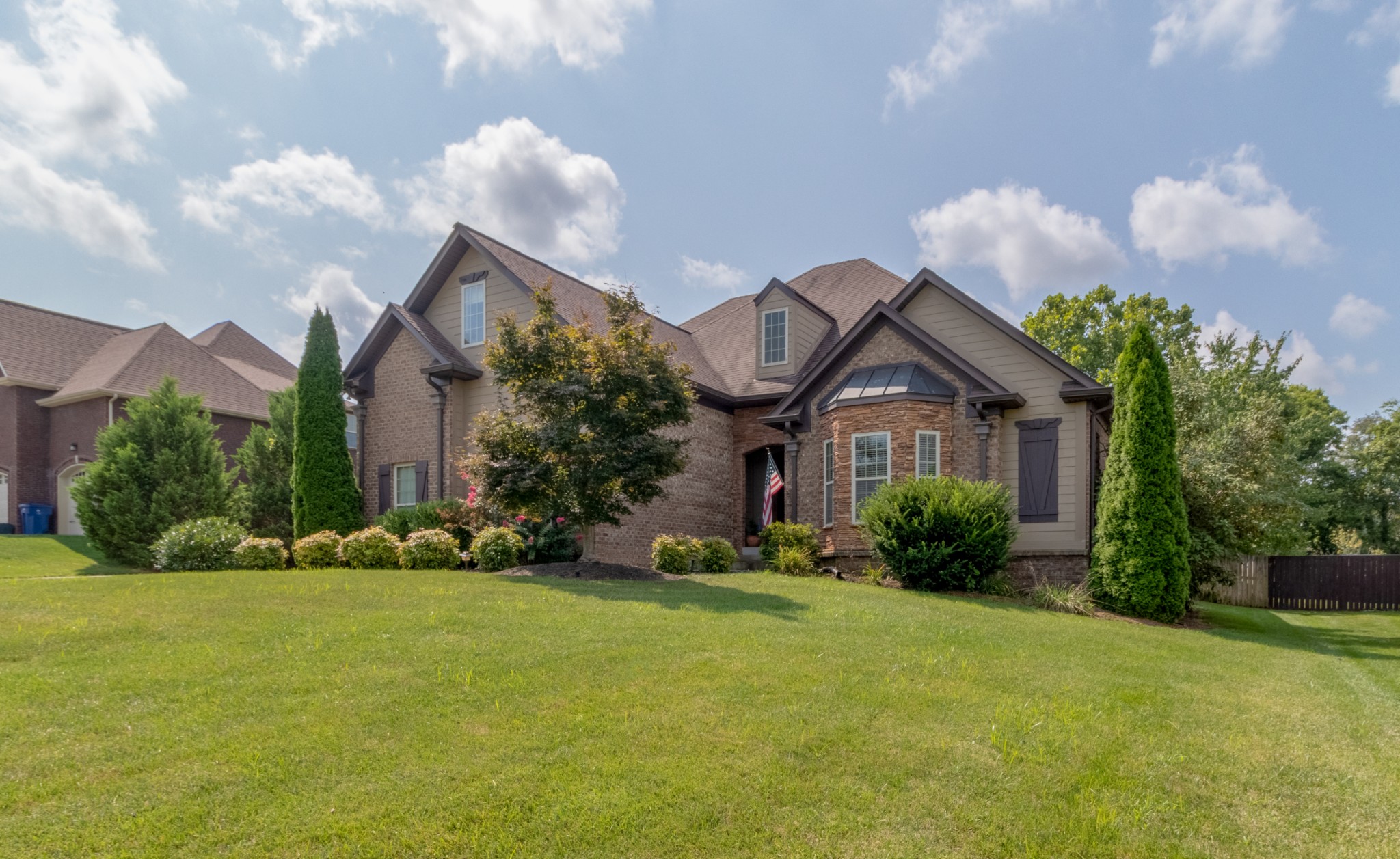 3592 Drake Road Adams, TN 37010 - Photo 3 of 47 a front view of a house with a yard and garage