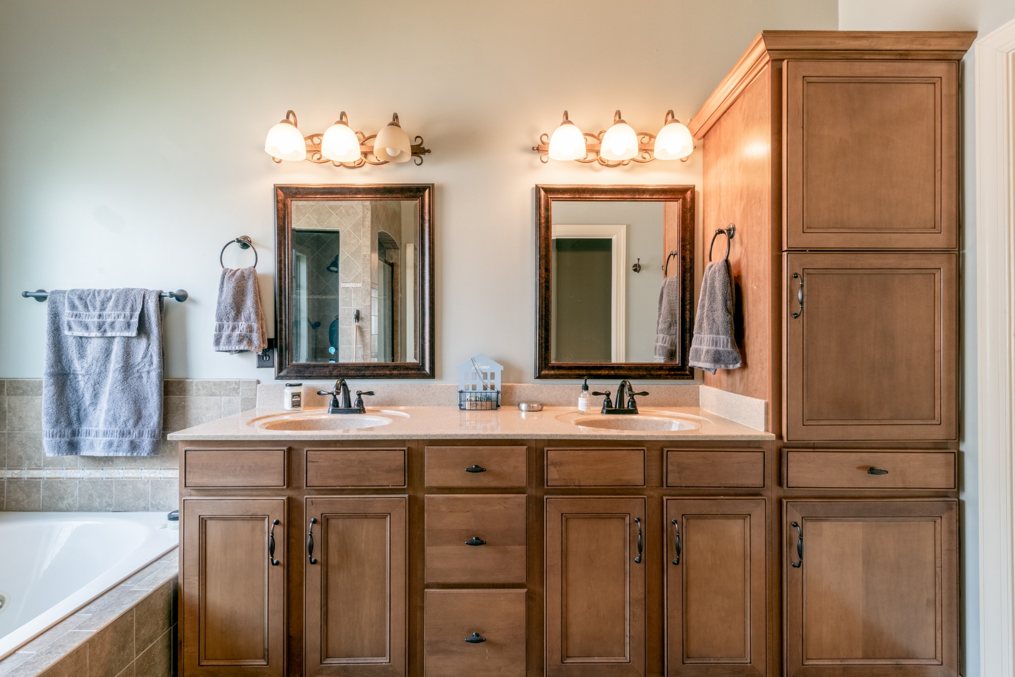 3592 Drake Road Adams, TN 37010 - Photo 22 of 47 a bathroom with a double vanity sink and a mirror