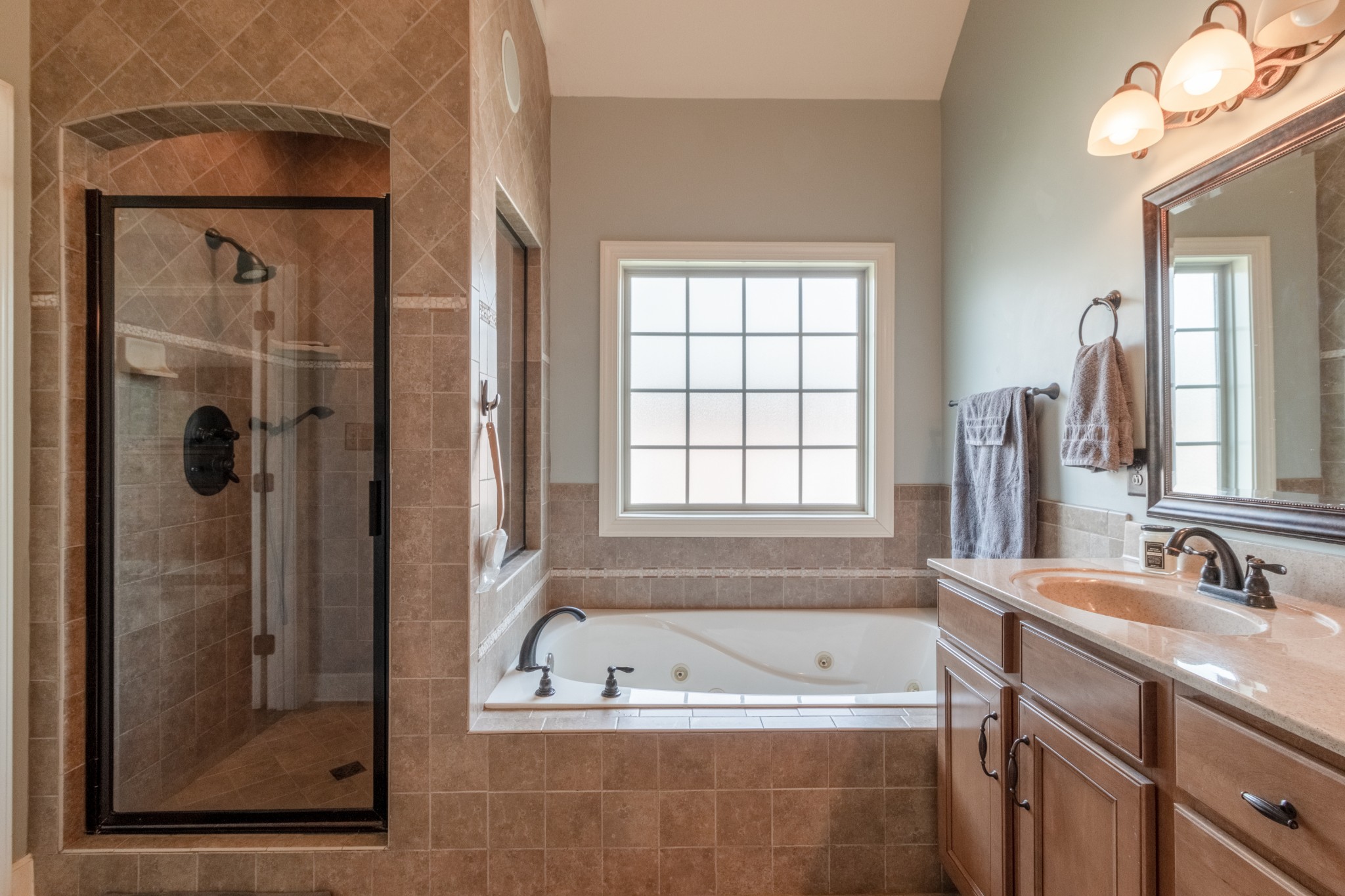 3592 Drake Road Adams, TN 37010 - Photo 23 of 47 a bathroom with a bathtub and a sink
