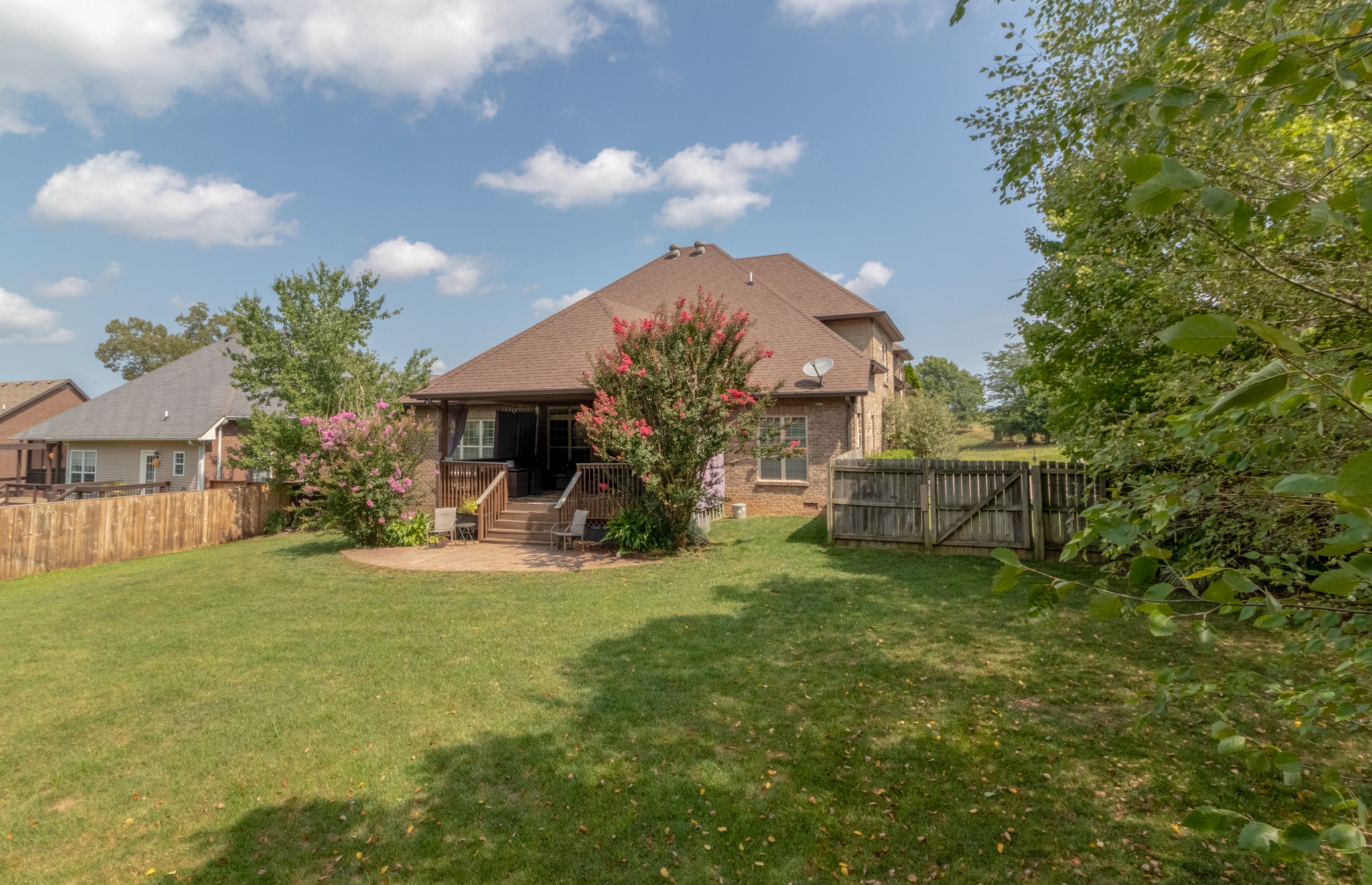 3592 Drake Road Adams, TN 37010 - Photo 45 of 47 a view of a house with a yard and sitting area