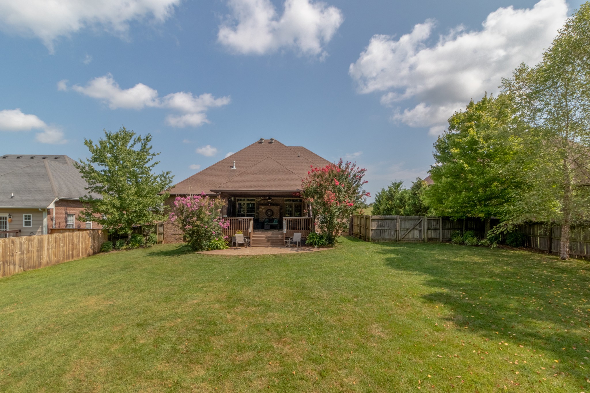 3592 Drake Road Adams, TN 37010 - Photo 46 of 47 a view of a house with a yard and sitting area