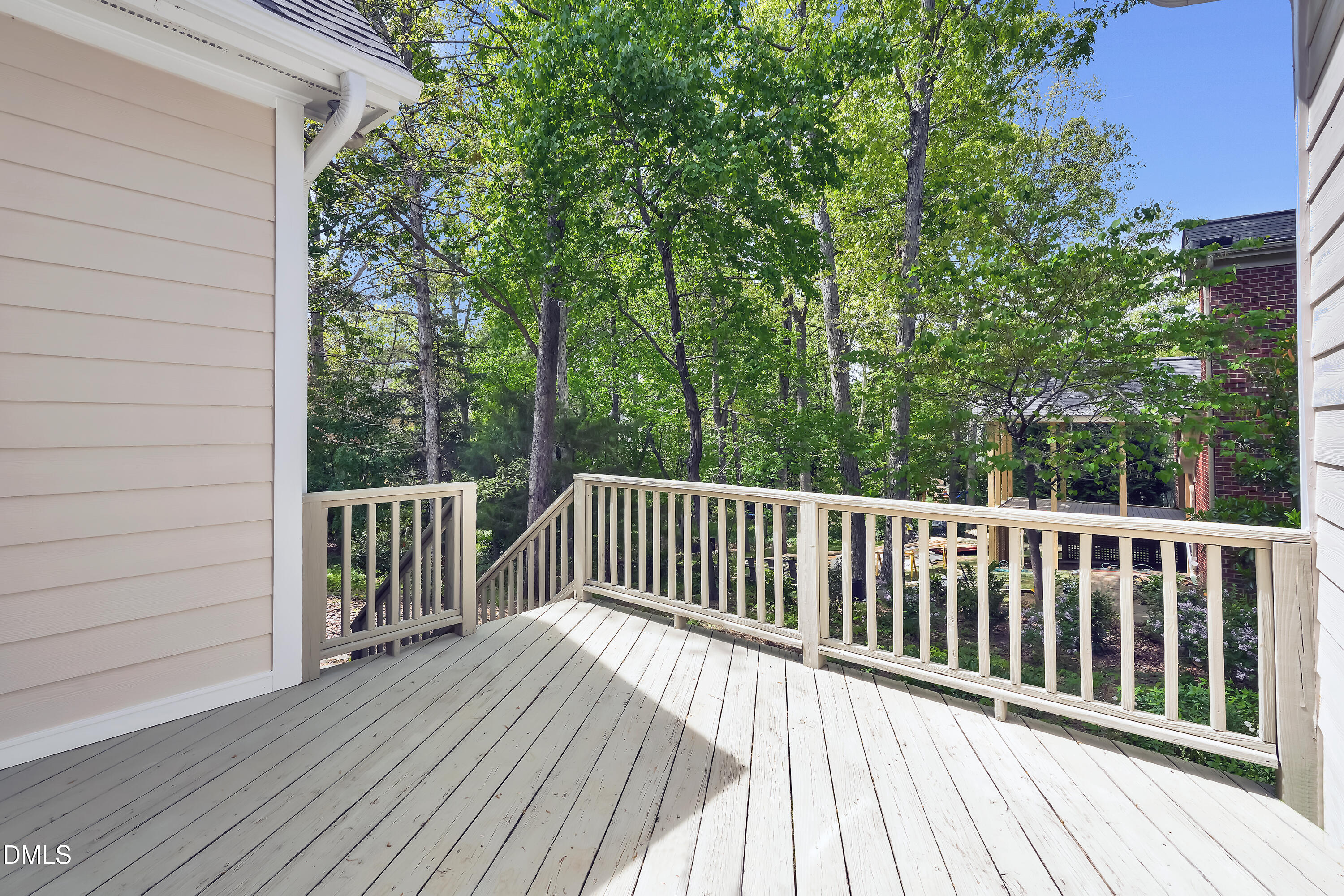 101 Sandy Hook Way Cary, NC 27513 - Photo 14 of 40 a balcony with wooden floor and fence