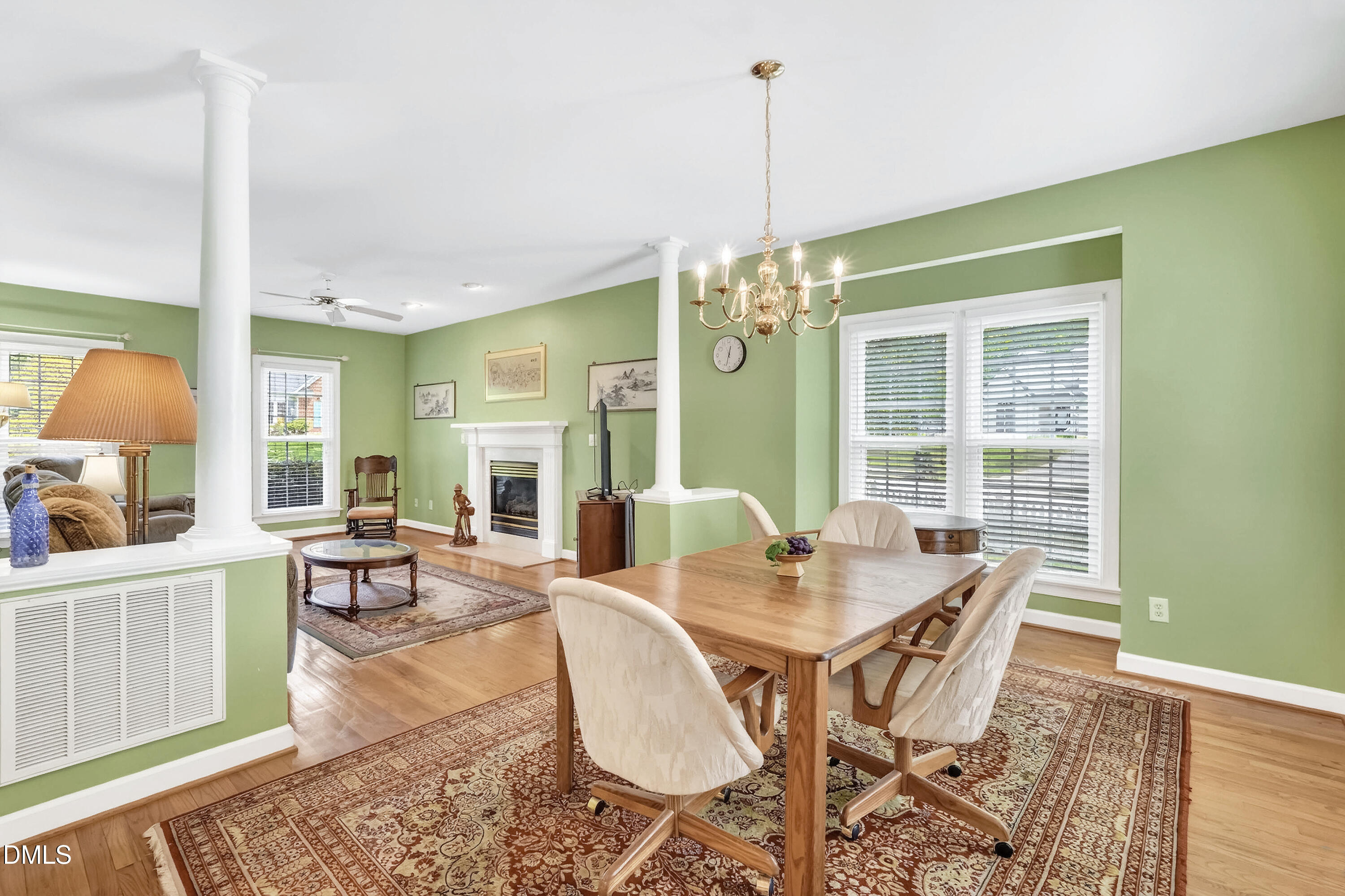 101 Sandy Hook Way Cary, NC 27513 - Photo 19 of 40 a view of a dining room with furniture wooden floor and chandelier