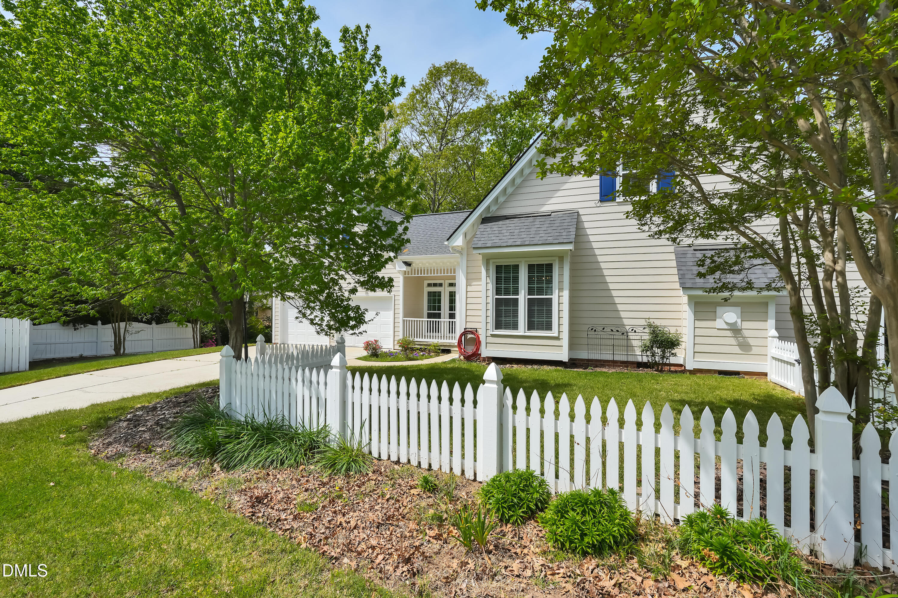 101 Sandy Hook Way Cary, NC 27513 - Photo 7 of 40 a white house that has tree in front of it