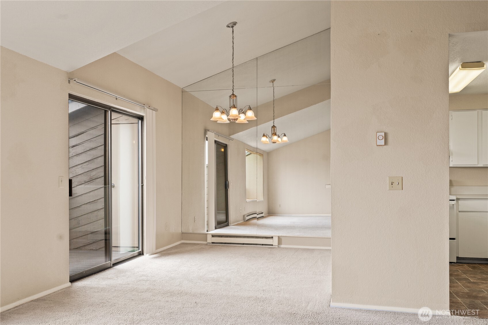 1319 South Puget Drive, Unit D35 Renton, WA 98055 - Photo 6 of 26 a view of a livingroom with a ceiling fan and window